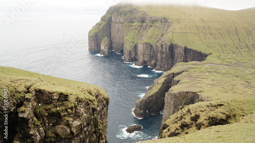 Ásmundarstakkur sea stack on Suðuroy Island in the Faroe Islands.