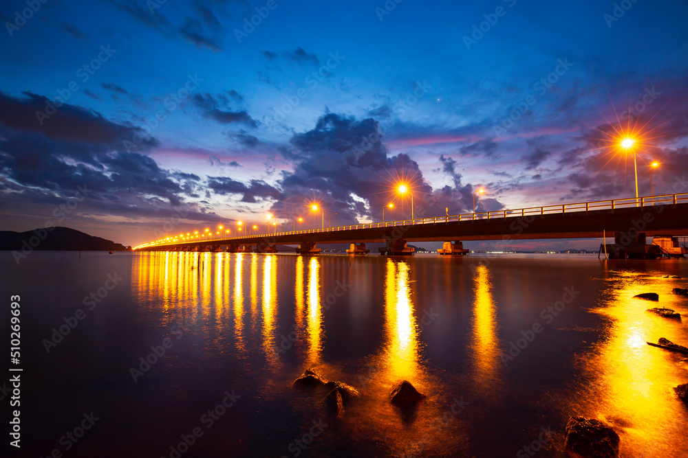 Sunrise morning sea bridge cross of the longest concrete bridge