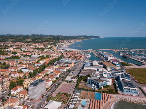 Italy, June 2022; aerial view of Fano with its sea, beaches, port, umbrellas in the marche region