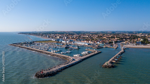 Italy, June 2022  aerial view of Fano with its sea, beaches, port, umbrellas © cristian