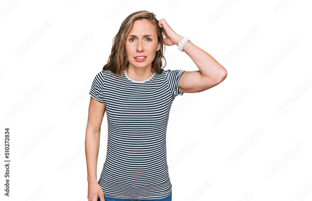 Young blonde woman wearing casual clothes confuse and wonder about question. uncertain with doubt, thinking with hand on head. pensive concept. Young blonde woman wearing casual clothes confuse and wonder about question. uncertain with doubt, thinking with hand on head. pensive concept.