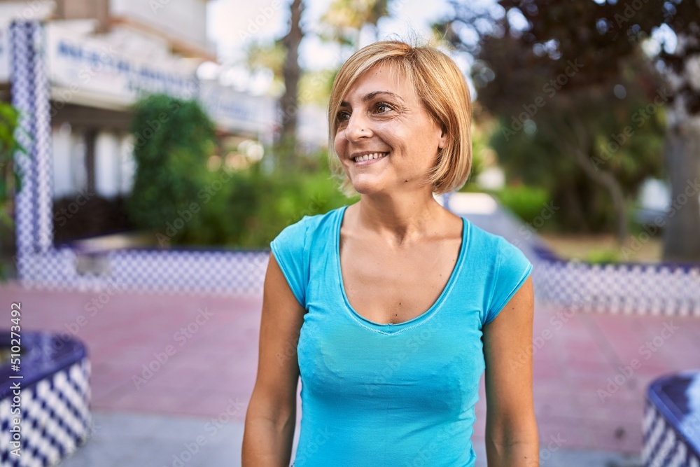 Middle age beautiful woman smiling confident at park Middle age beautiful woman smiling confident at park