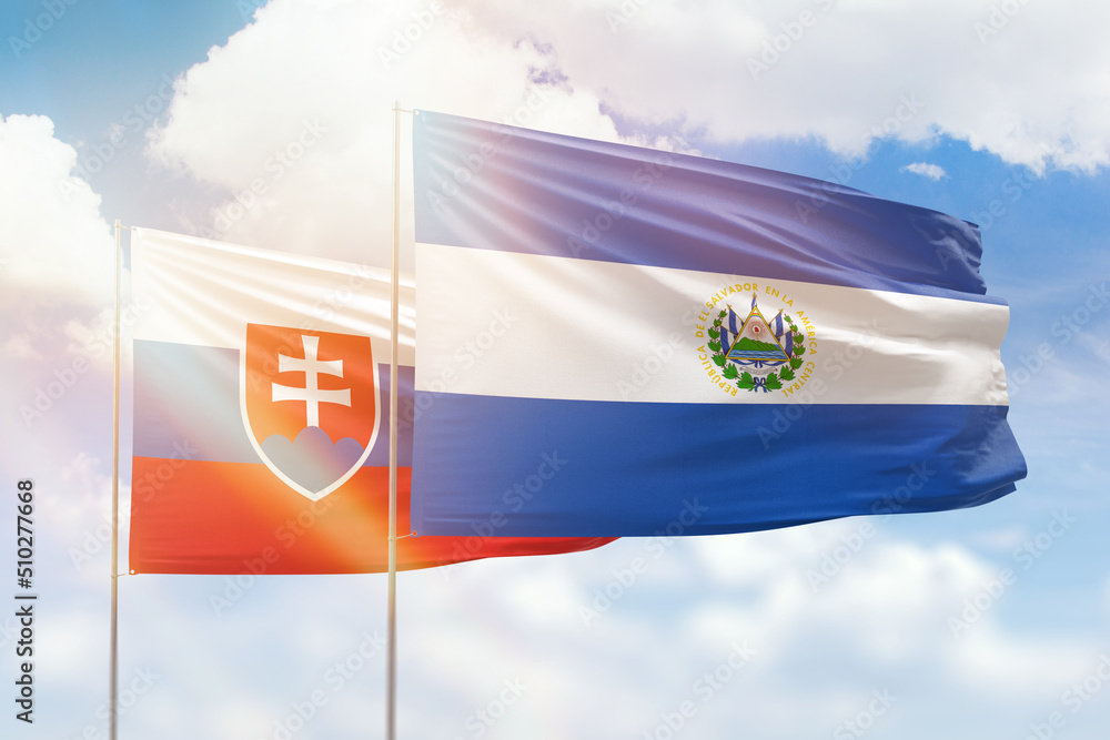 Sunny blue sky and flags of el salvador and slovakia - obrazy, fototapety, plakaty 
