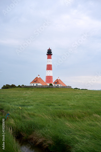 Westerheversand Lighthouse and Salzwiesen (salt marsh) in summer, Westerhever, Nordfriesland, Schleswig-Holstein, Germany