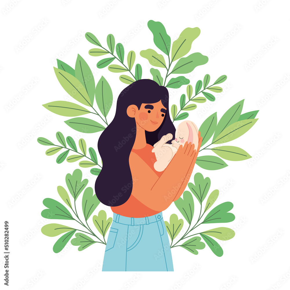 woman holding a rabbit woman holding a rabbit