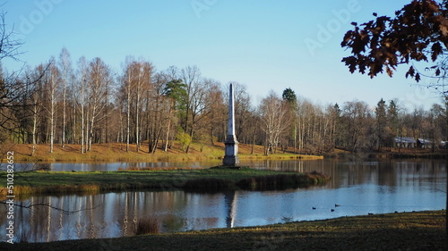 Historical monument. Chesme obelisk, autumn park and lake. State Museum-Reserve Gatchina. Leningrad region, Russia. photo