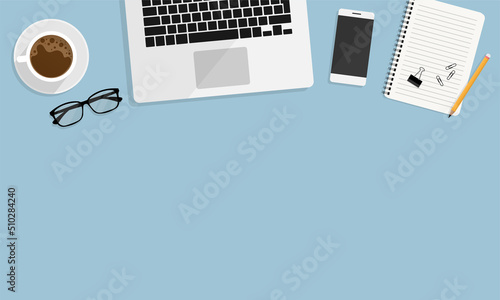 top view office desk with laptop, notebooks and coffee cup on blue background. Creative flat layo of workspace desk with copy space. vector illustration modern flat design. flat lay.