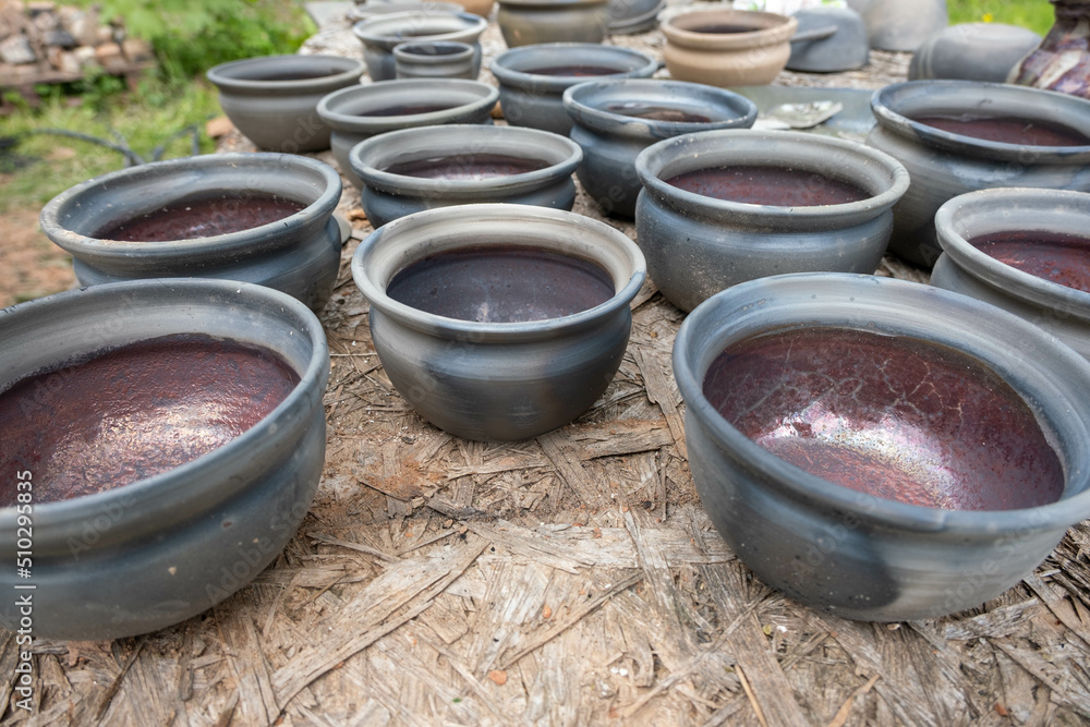 fired earthenware removed from the kiln. Mugs, pots, plates and everything else beautiful and useful. Latvian national cultural heritage fired earthenware removed from the kiln. Mugs, pots, plates and everything else beautiful and useful. Latvian national cultural heritage