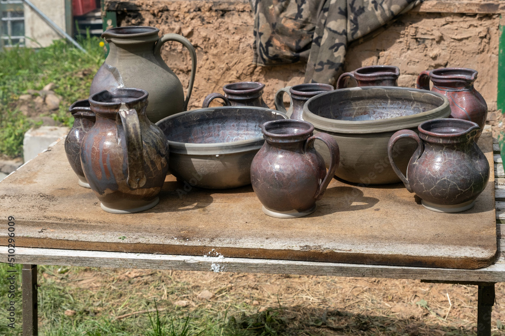 fired earthenware removed from the kiln. Mugs, pots, plates and everything else beautiful and useful. Latvian national cultural heritage fired earthenware removed from the kiln. Mugs, pots, plates and everything else beautiful and useful. Latvian national cultural heritage