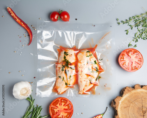 Chicken fillet with tomato in vacuum