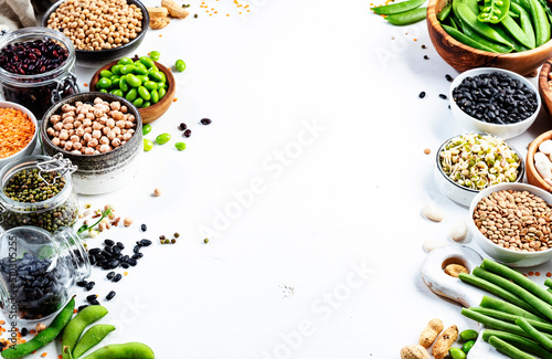 Beans, legumes and green sprouts. Dried, raw and fresh, top view. Red beans, lentils, chickpeas, soybeans. Healthy, nutritious, diet food, vegan proetin, micronutrients and fiber sources