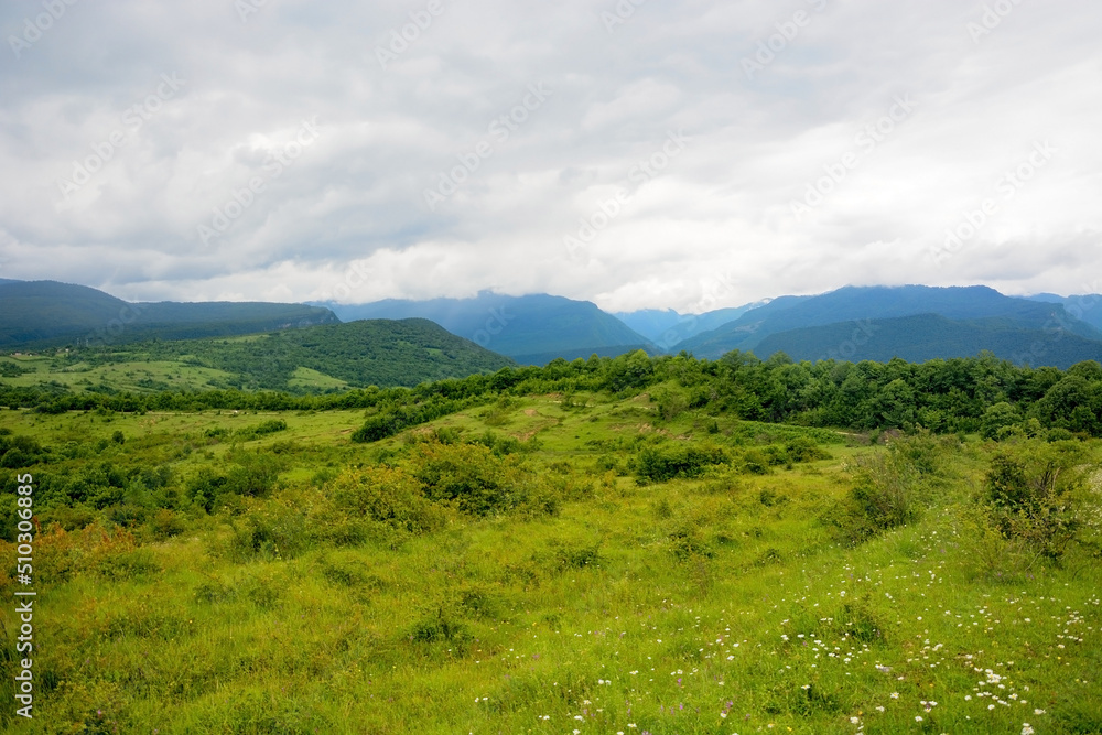 Alpine meadows, foggy mountains at Abkhazia (Kodori Gorge)