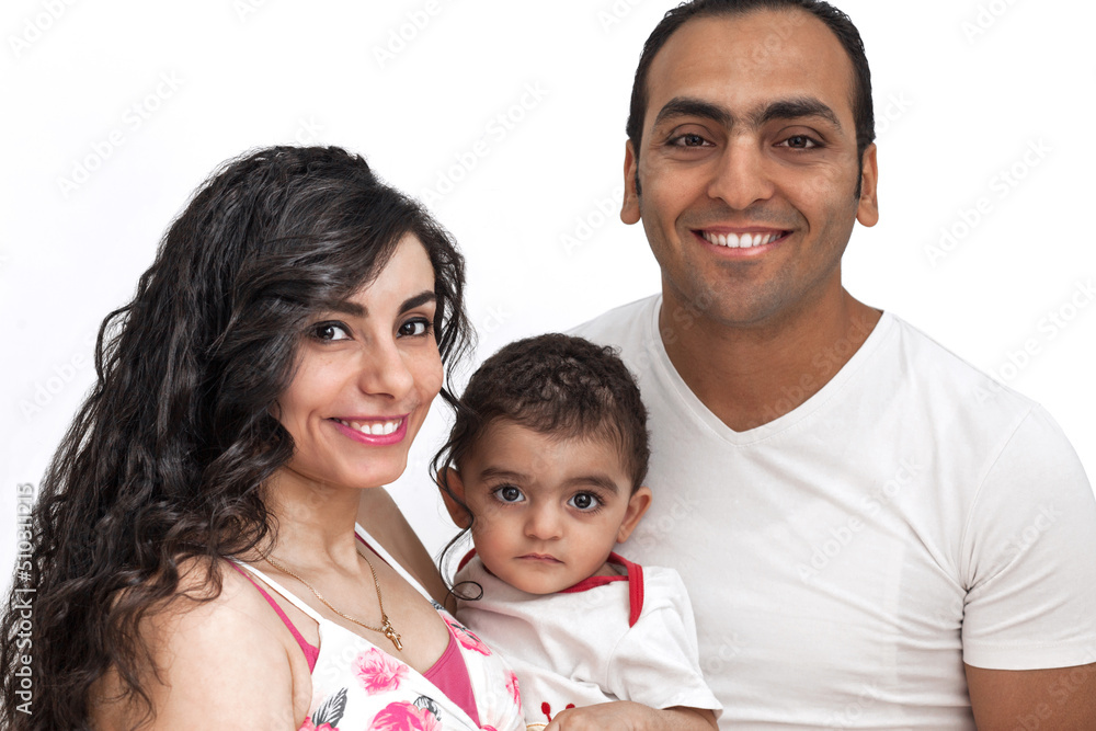 Studio portrait of a young family on a white background. High quality photo Studio portrait of a young family on a white background. High quality photo