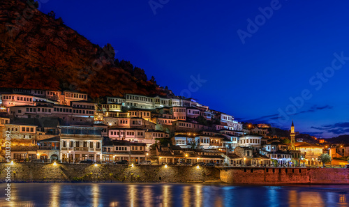 Skyline of the old city of Berat with its ancient houses, at the dusk in Albania.