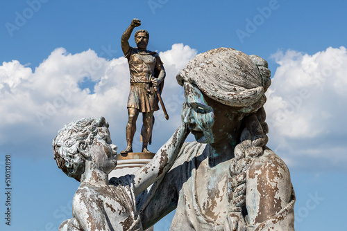 Statues of baby Alexander The Great, his mother Olympias and his father King Philip in the city square of Skopje, North Macedonia