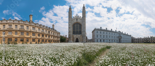 King's College Chapel in Cambridge Panoramic Photo with its lovely garden with Flowers and a Beautiful Skyline photo