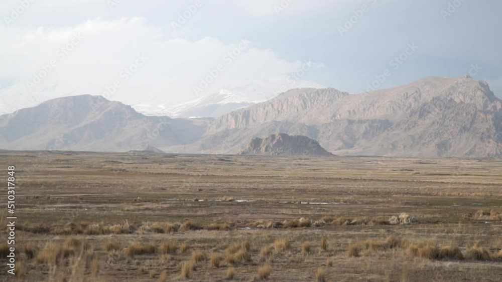 Fascinating view of high mountains and serene valley Fascinating view of high mountains and serene valley