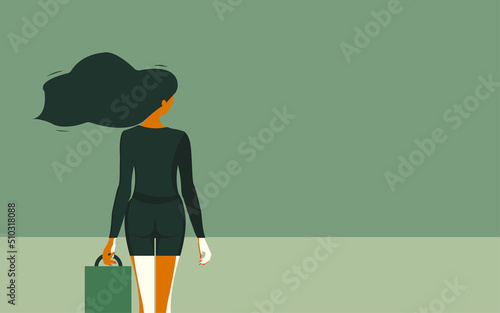 Beautiful slim young woman with a handbag in her hand rear view. Nearby there is a place for text.