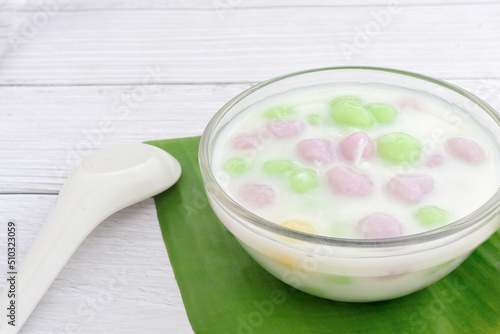 Thai dessert with colorful flour, milk and egg, rainbow tapioca Famous Thai dessert, Bualoy photo