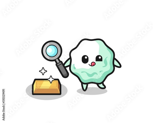 chewing gum character is checking the authenticity of the gold bullion
