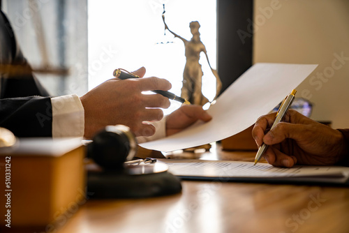 Photography Attorneys or lawyers who are reading the statute of limitations Consultation between male lawyers and business clients, tax and legal and legal services firms