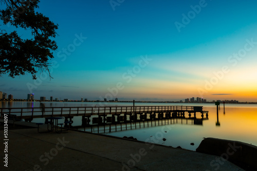 Morning Sunrise, dock forground, Tampa Background