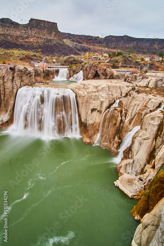 Spring waters at Shoshone Falls in Idaho with tan rocks photo