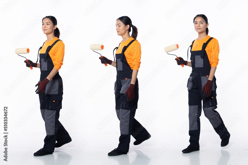 Obraz premium Full length 20s young Asian Woman decoration painter, walking forward left right
