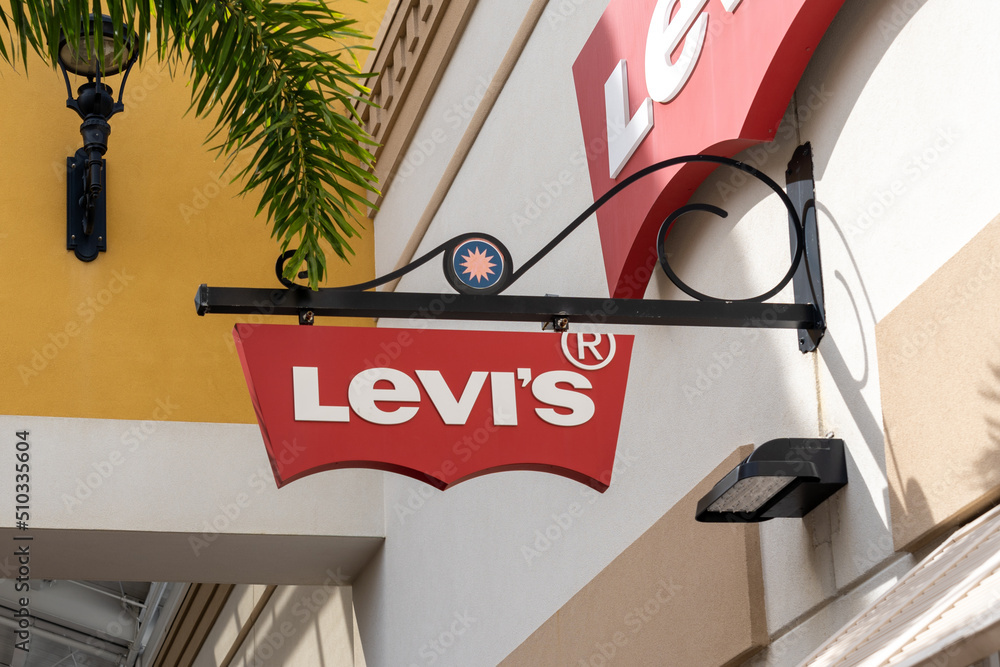Orlando, Florida, USA- January 21, 2022: Levi's store hanging sign in  Orlando, Florida, USA. Levi Strauss is an American clothing company known  for its Levi's brand of denim jeans. Stock Photo | Adobe Stock