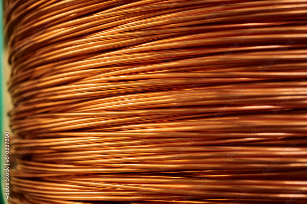 Shiny winded copper cable in warehouse of production plant Shiny winded copper cable in warehouse of production plant
