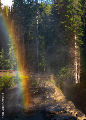 Fototapeta Naklejka Na Ścianę i Meble -  Athabasca Falls in Jasper, Alberta with Rainbow.  Mountains and beauty.