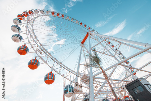 19 May 2022  Antalya  Turkey  Heart of Antalya ferris wheel in amusement park against sky background. Entertainment and fair concept.