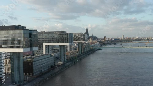 Wallpaper Mural Aerial footage of Wide Rhine river flowing through city. Former harbour redesigned as residential and commercial quarter. Cologne, Germany Torontodigital.ca