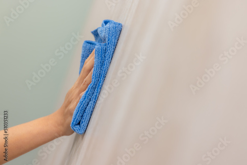 Картината върху платно Woman clean the wardrobe at home