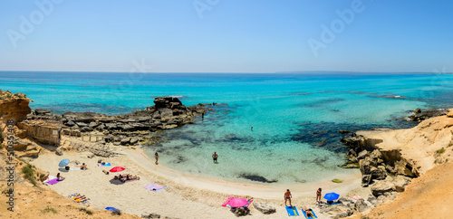 Fototapeta Naklejka Na Ścianę i Meble -  One of the best known beaches in Formentera. It is Calo des Mort. With clear and calm waters, this beach is frequented by couples on vacation.