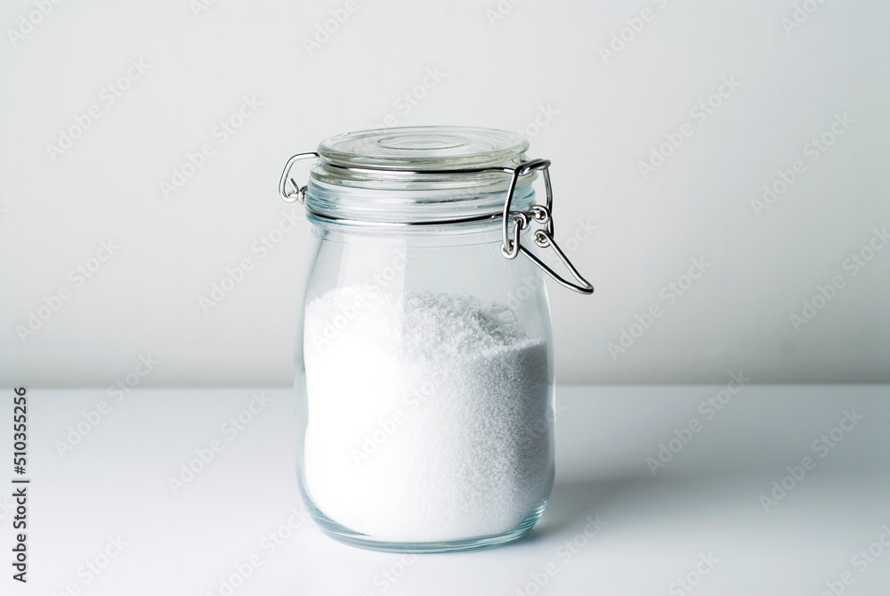 clear glass jar with white snow clear glass jar with white snow