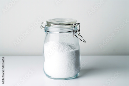 clear glass jar with white snow photo