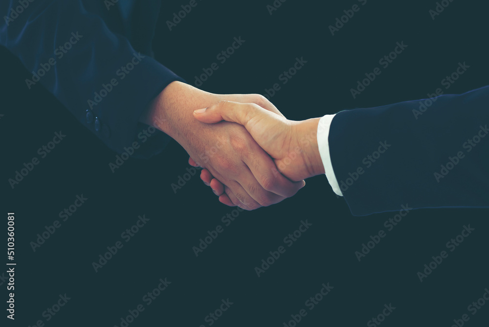 Close up on hands Business handshake investment successful Close up on hands Business handshake investment successful