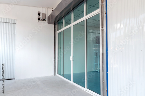 Close-up of sliding glass doors of a newly built building.
