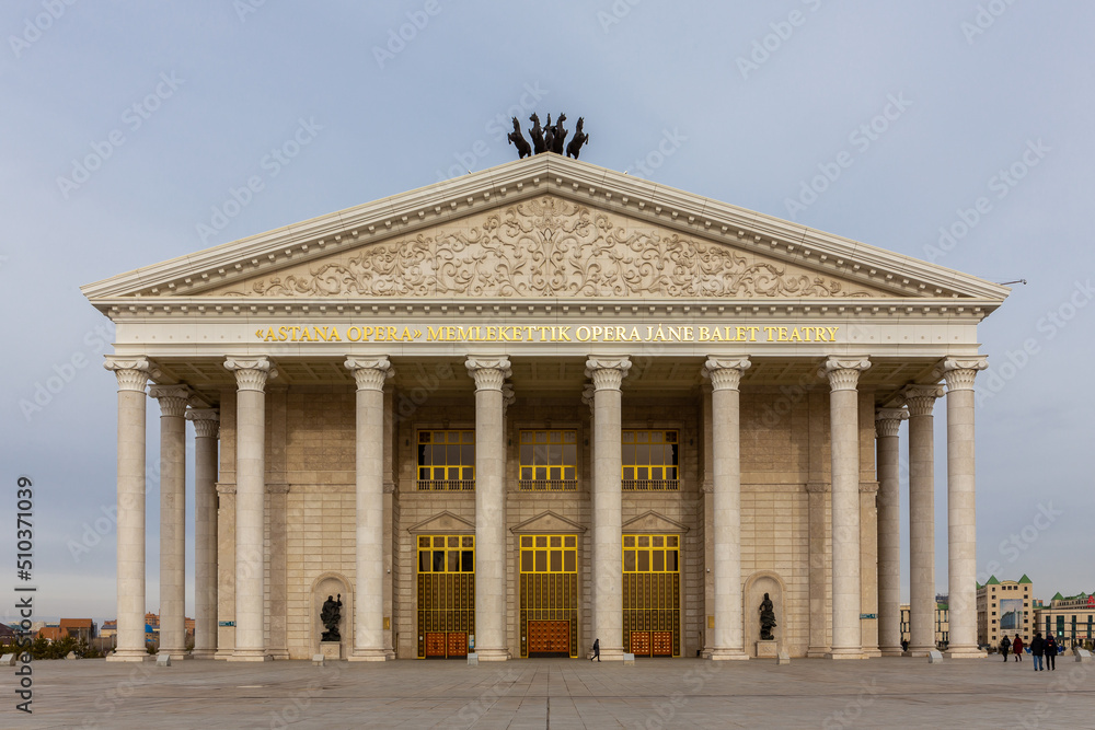 Obraz premium Astana Opera in Nur Sultan (Astana), Kazakhstan, classical style building with golden ornaments, sculptures, columns and pediment, symmetrical view.
