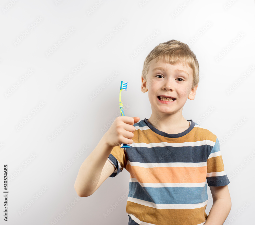 the boy with the toothbrush. Health care, dental hygiene. Little boy cleaning teeth. the boy with the toothbrush. Health care, dental hygiene. Little boy cleaning teeth.