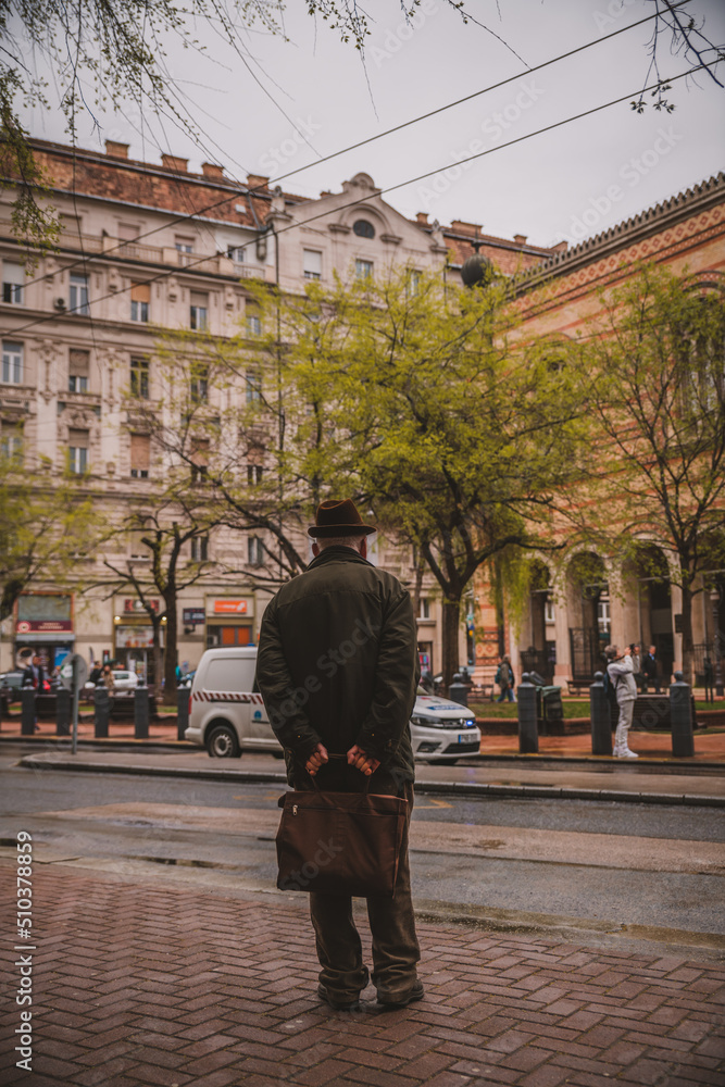 Fototapeta premium Man waiting for bus in Budapest