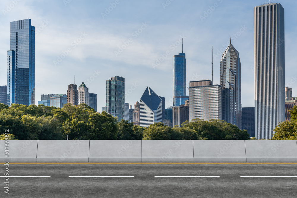 Empty urban asphalt road exterior with city buildings background. New modern highway concrete construction. Concept of way to success. Transportation logistic industry fast delivery. Chicago. USA. Empty urban asphalt road exterior with city buildings background. New modern highway concrete construction. Concept of way to success. Transportation logistic industry fast delivery. Chicago. USA.