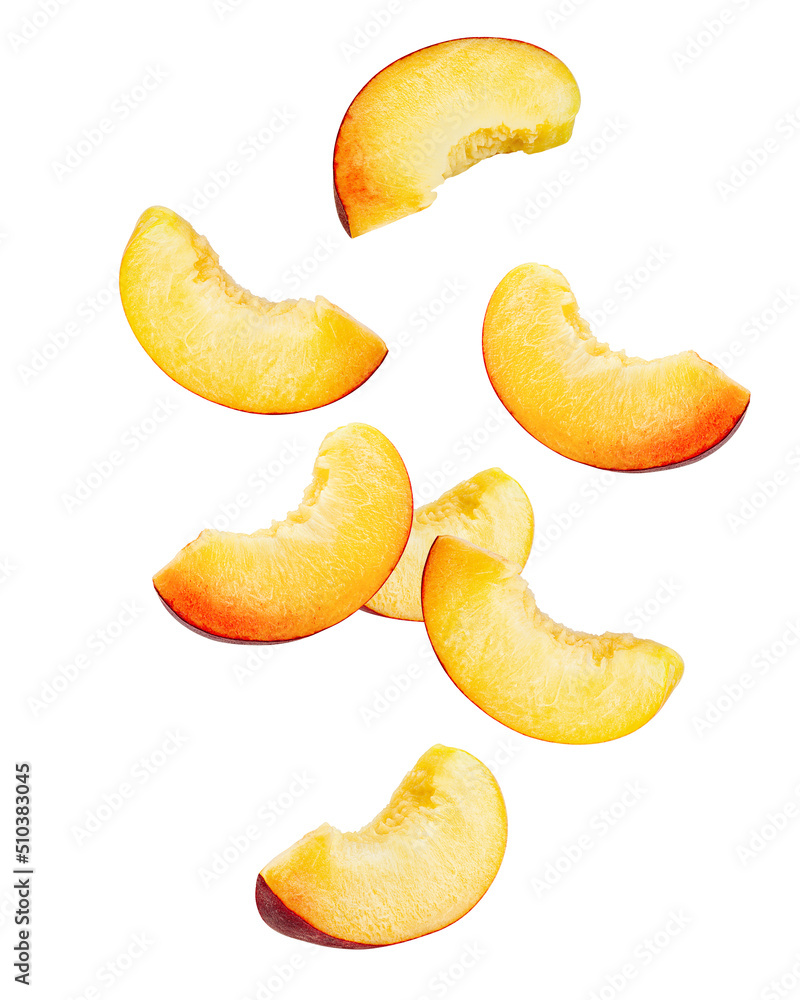 Falling Nectarine or peach, slice, isolated on white background, clipping path, full depth of field Falling Nectarine or peach, slice, isolated on white background, clipping path, full depth of field