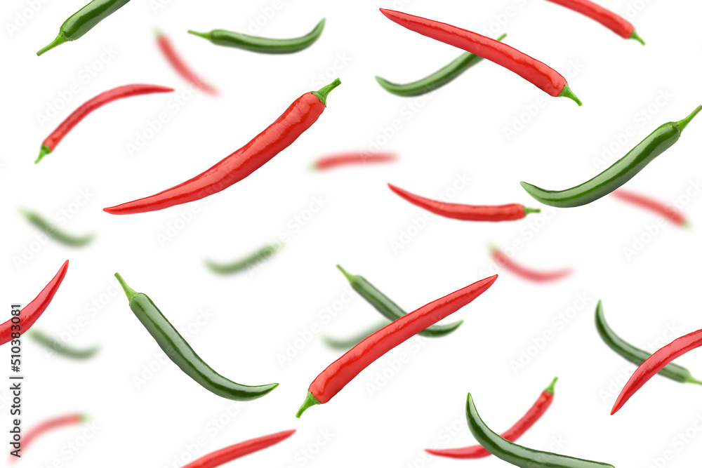 Falling hot chili pepper, isolated on white background, selective focus Falling hot chili pepper, isolated on white background, selective focus