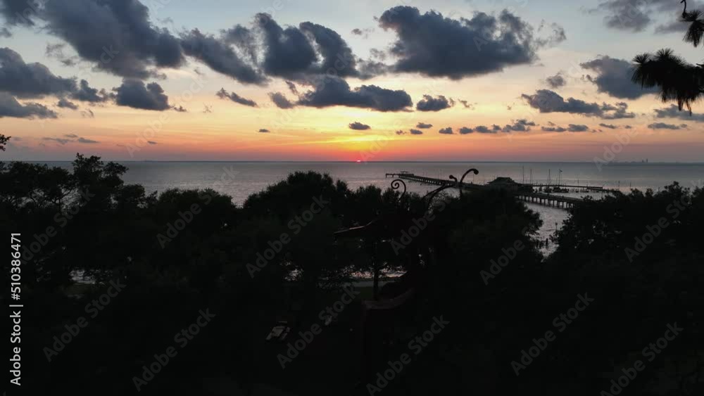 Aerial view of sunset over Mobile Bay, Seahorse sculpture in Alabama Aerial view of sunset over Mobile Bay, Seahorse sculpture in Alabama