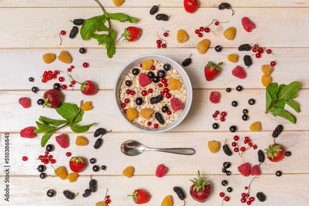 Bowl with oatmeal and berries. Bowl with oatmeal and berries.