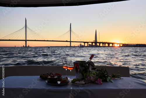 Romantic luxury evening on cruise yacht with champagne setting © Дмитрий Модестов