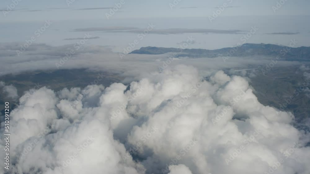 Aerial view from plane, clouds Aerial view from plane, clouds