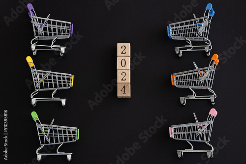 New Year 2024 Creative Design Concept with Shopping trolley